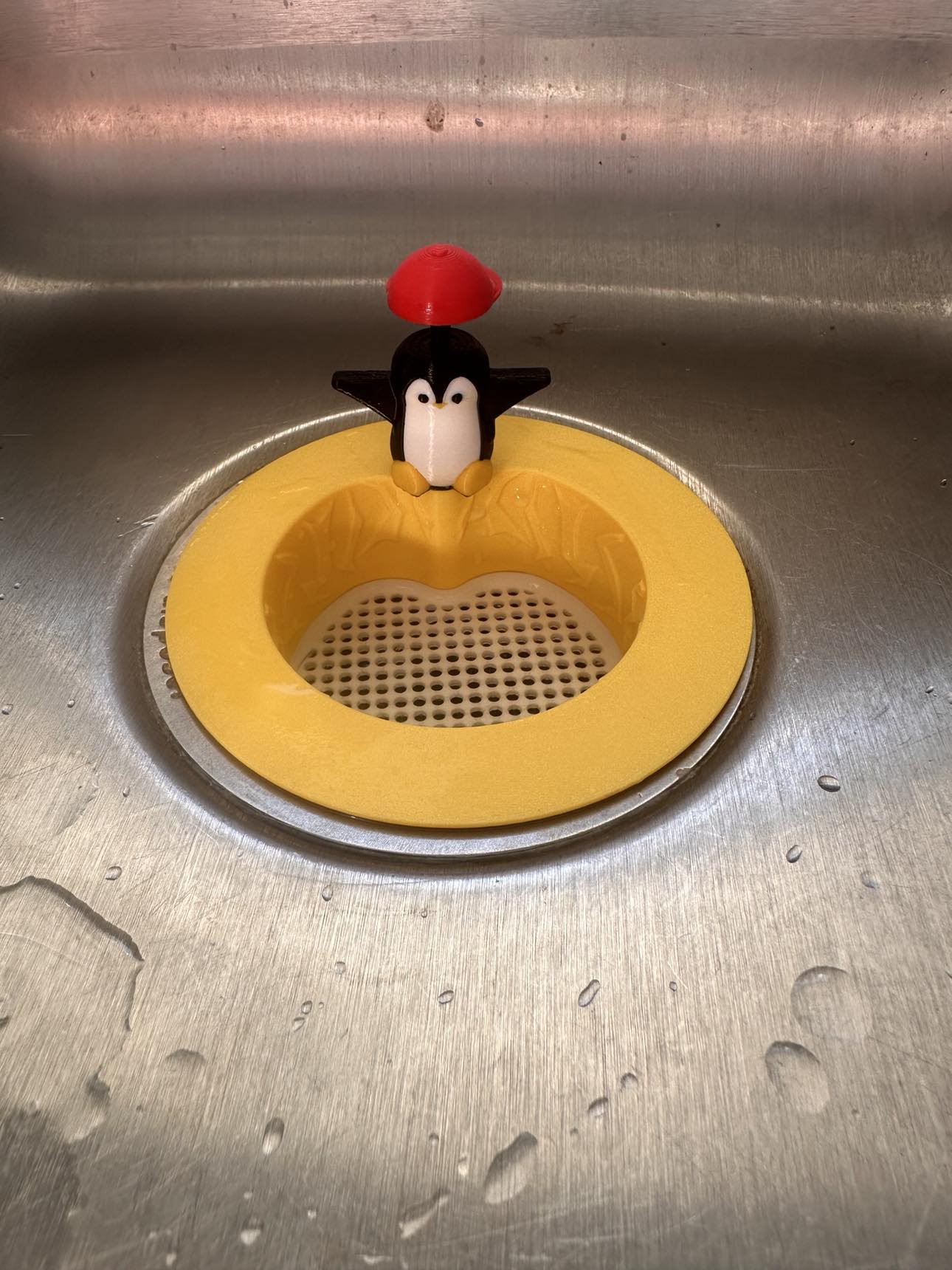 Adorable 3D-Printed Penguin Sink Strainer β Eco-Friendly and Functional Drain Protector